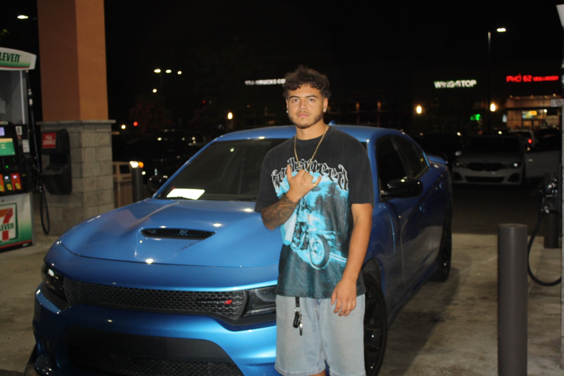 Blue Charger — Gas Station / Night